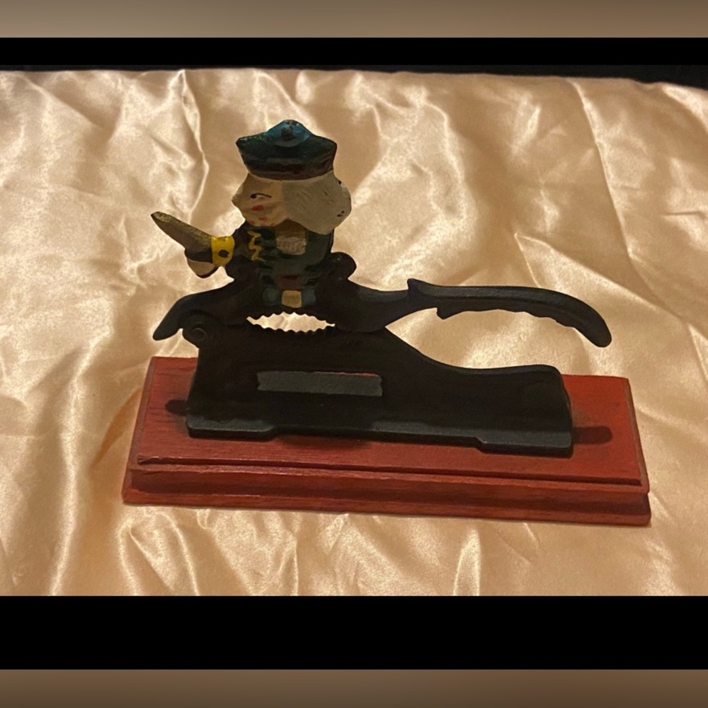 Vintage Painted Cast Iron Nut Cracker on Wood Stand